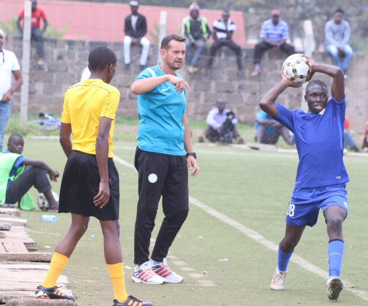 Coach Sanjin Alagic looks on as Kevin Chumsy Okumu takes a throw-in in a past game