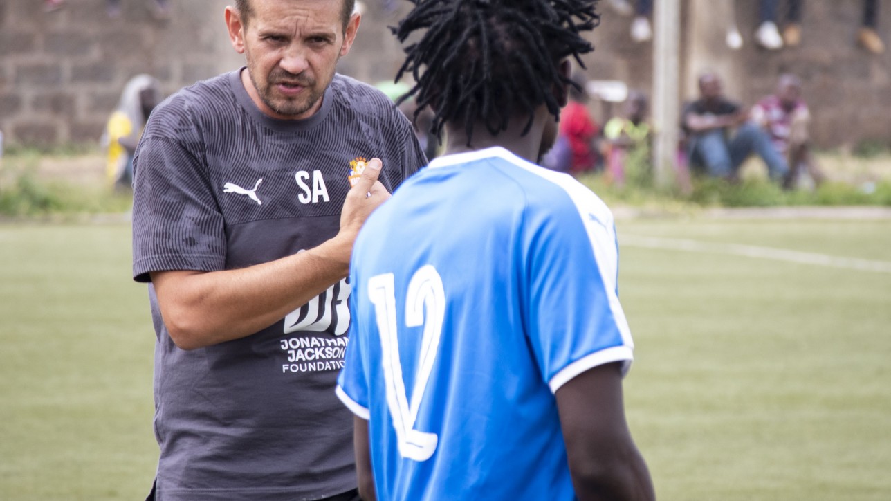 Head coach Sanjin Alagic giving instructions to Edwin Buliba in a past game.
