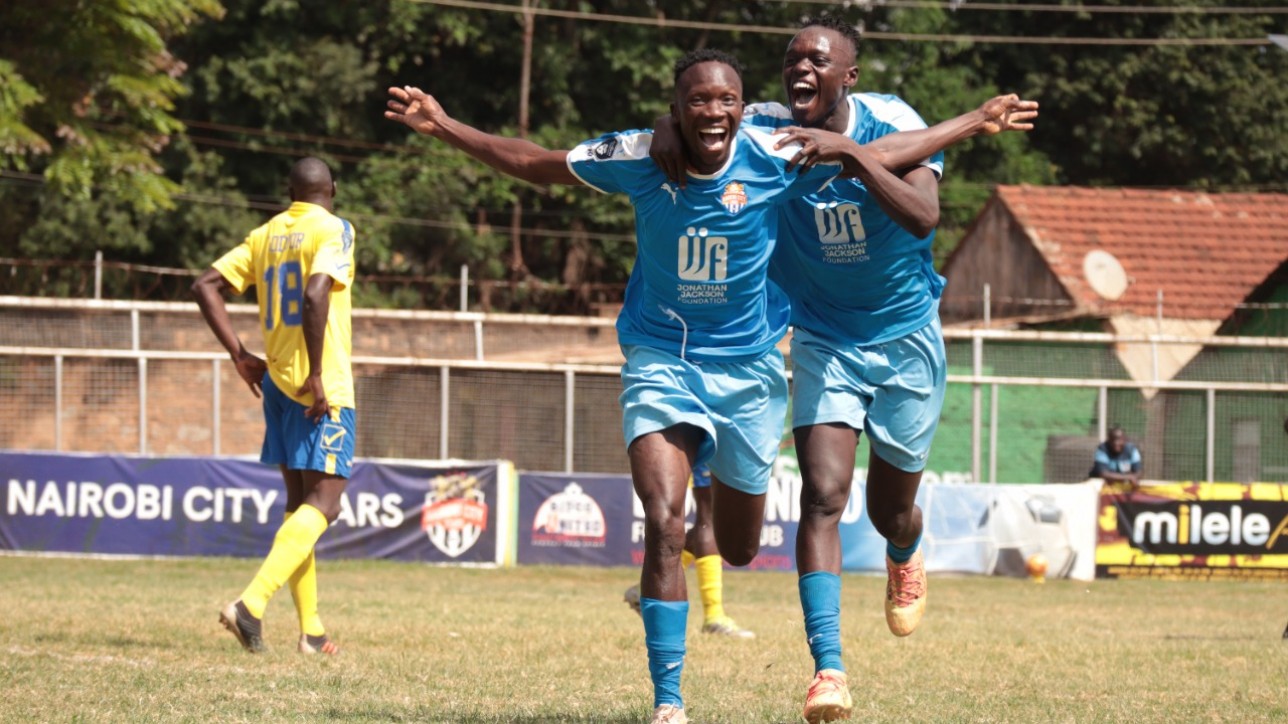 Erick Ombija in full celebration, and hugged by Timothy Ouma, following his goal against Bidco United at the Thika Stadium on Sun 24 Oct 2021. City Stars won the game 2-0