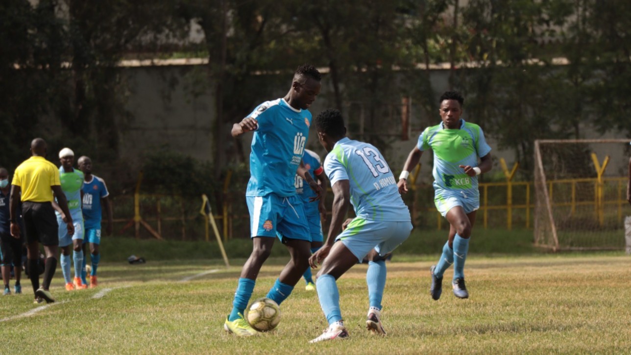 Nairobi City Stars attacking mid Timothy Ouma challenged by KCB stopper Robinson Kamura during an FKF Premier League tie in Ruaraka on Fri 17 Dec 2021. KCB won the tie 1-0