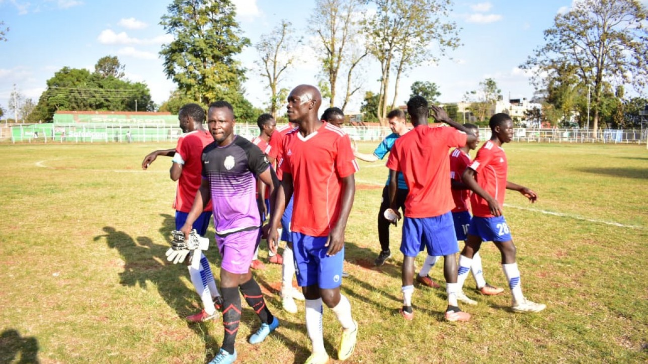 Defender Mwangi (with keeper Levis Opiyo) has parted ways with the club after six months