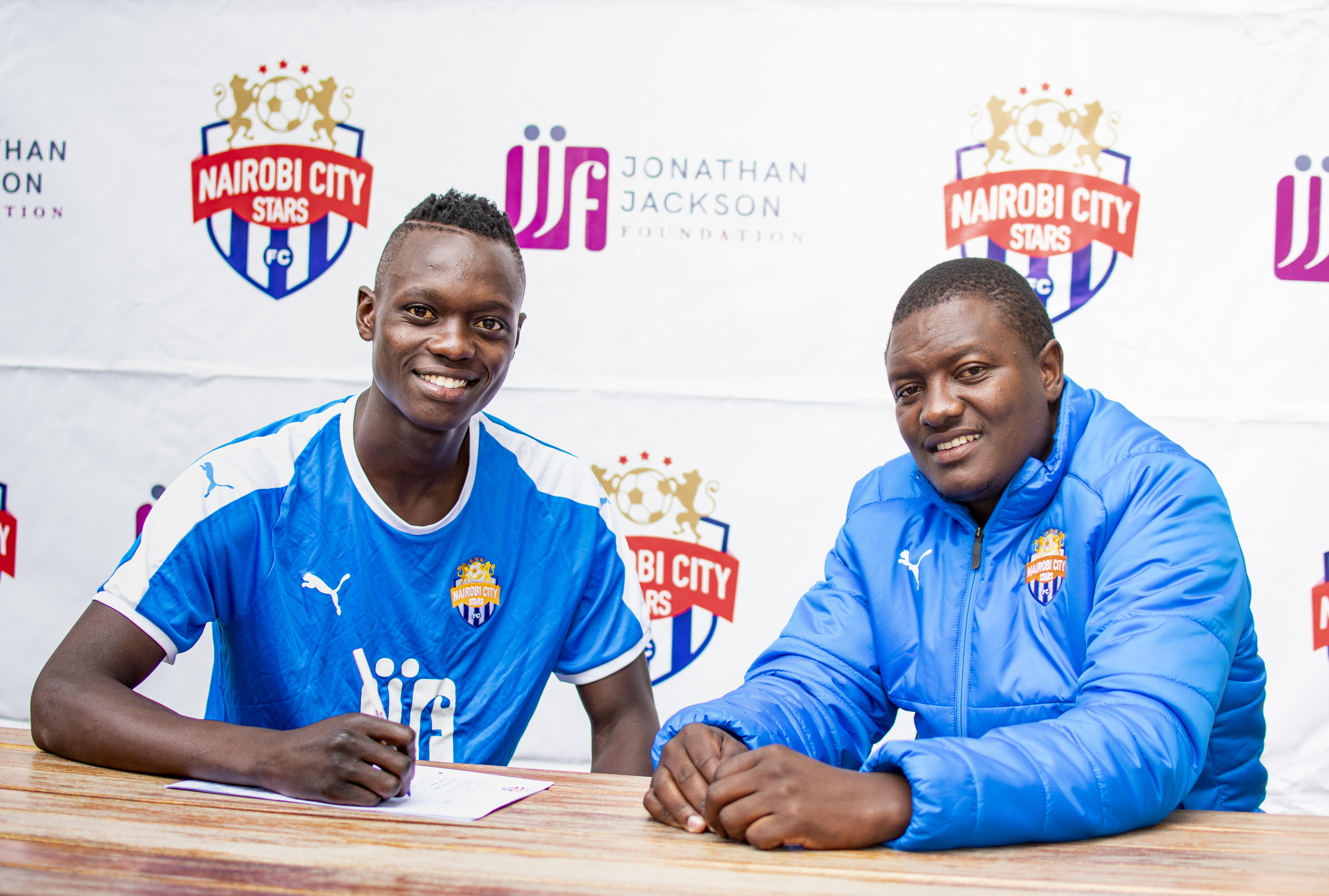 Timothy 'Babu' Ouma with team coordinator during his unveiling at City Stars on Wed 19 Aug 2020 at the club offices in Upper Hill