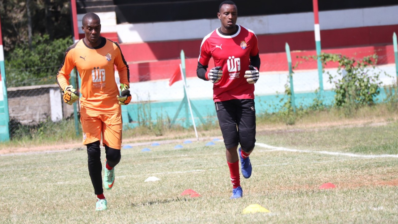 Nairobi City Stars goalkeepers Jacob Osano (Golden Poppy) and Steve Njunge (red) warming up ahead of a round 22 premier league game against Nzoia United in Narok on Friday 25 June 2021