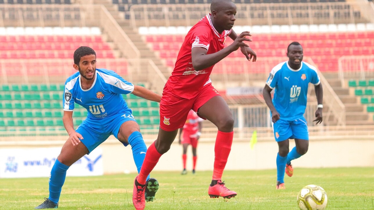 Mohammed Bajaber and Newton Ochieng go for the ball against Police' stopper Kevin Ouma during the Elite Pre-season Cup final at Nyayo Stadium on Sat 1 Oct 2022. Police won it 2-0